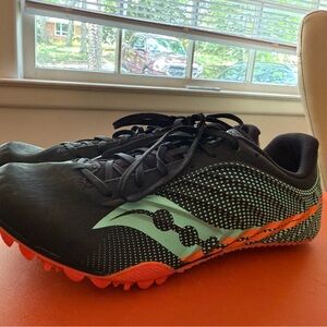 Saucony Black and Mint Track Shoes with Orange Accents